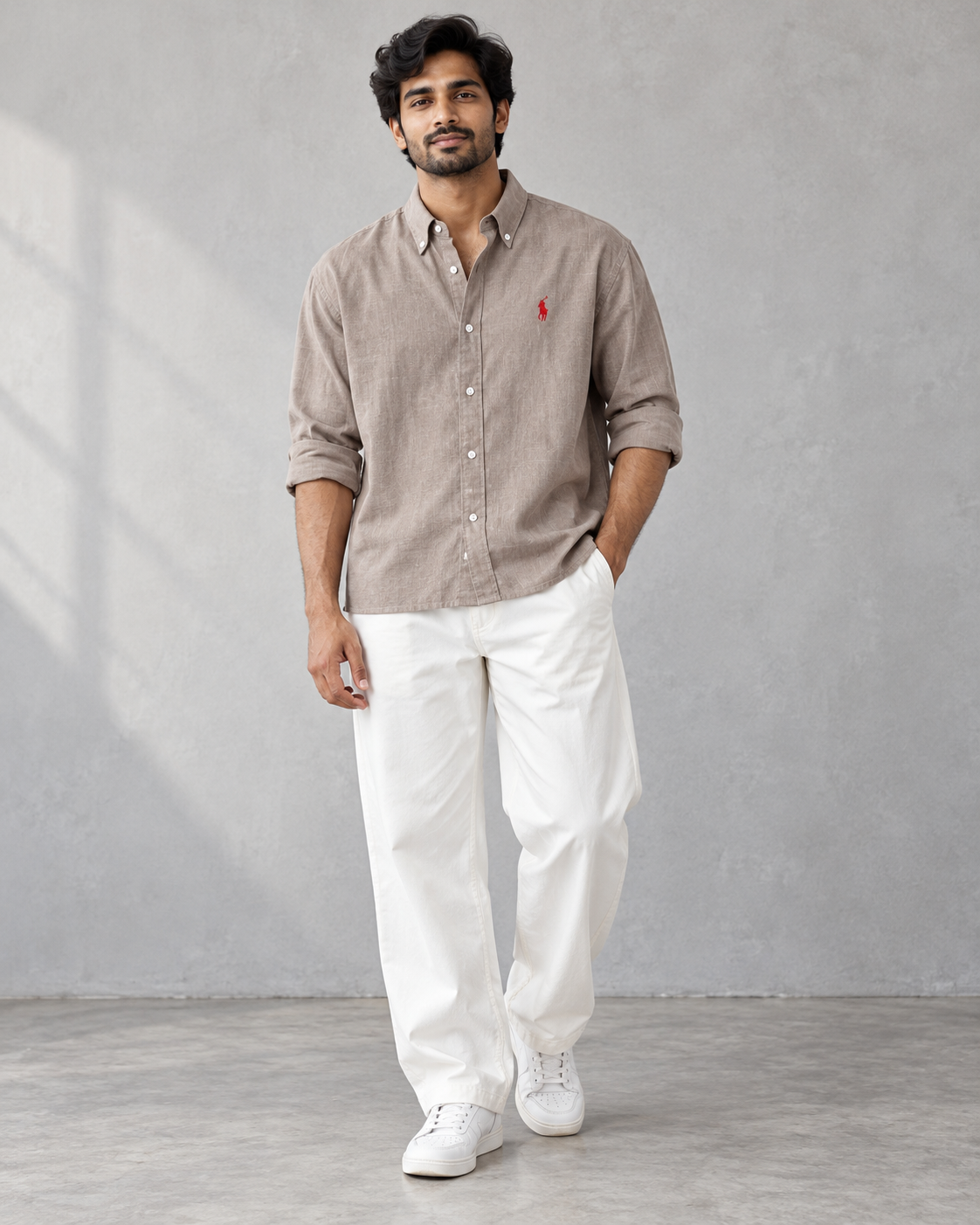 Taupe boxy-fit shirt — model wearing shirt with neatly rolled sleeves