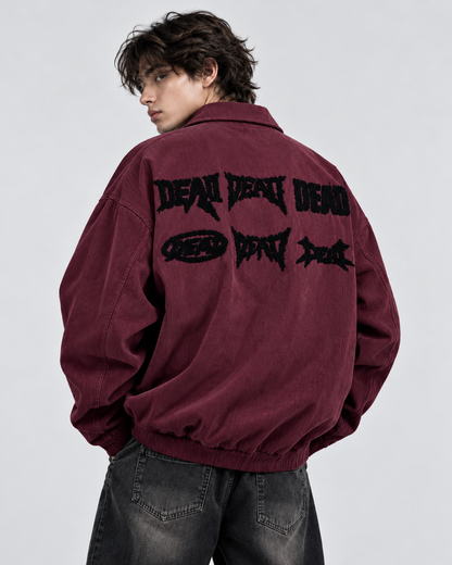 Maroon zip-up collared shirt - model wearing the black graphic back design