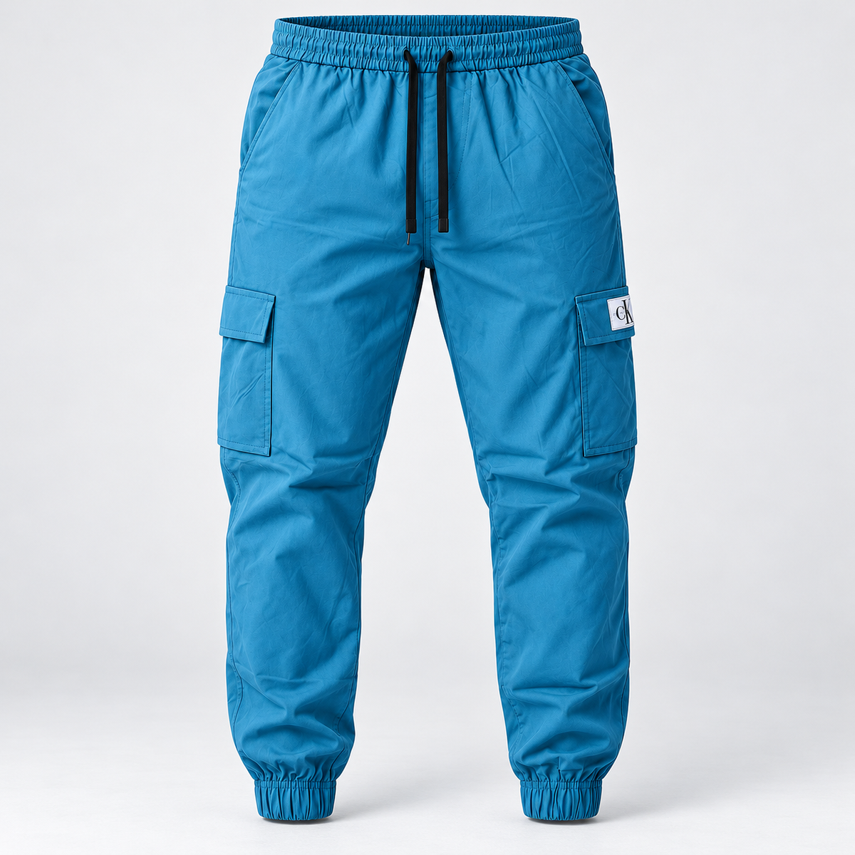 Teal blue cargo jogger pants, full front product-only view.