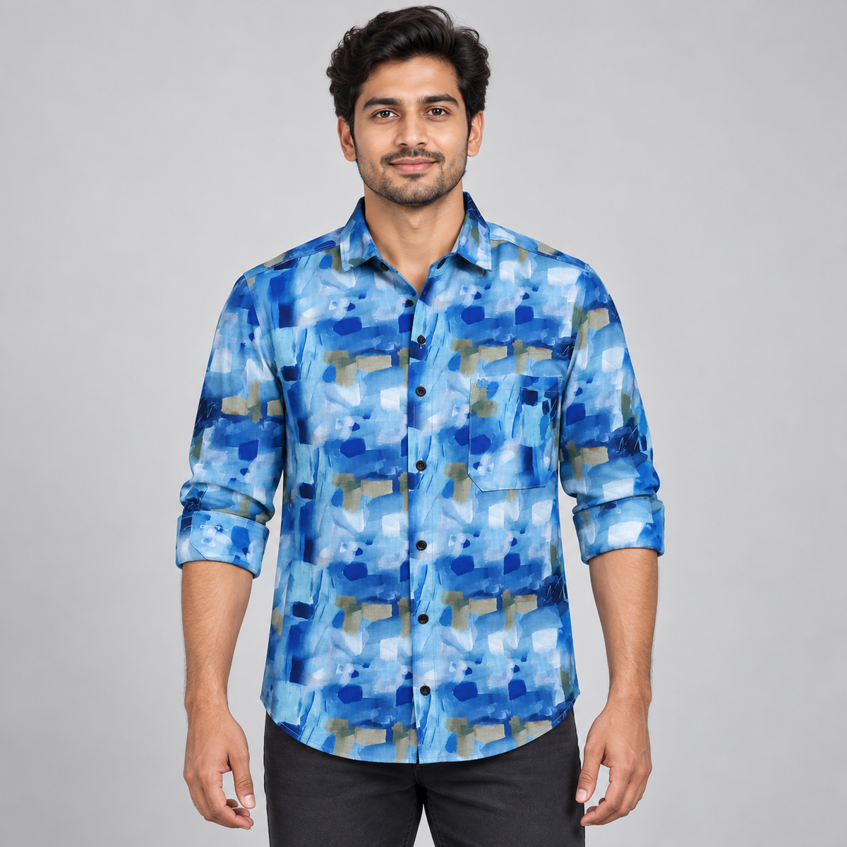 Blue painterly block print full sleeve pocket shirt, on an adult model, front view