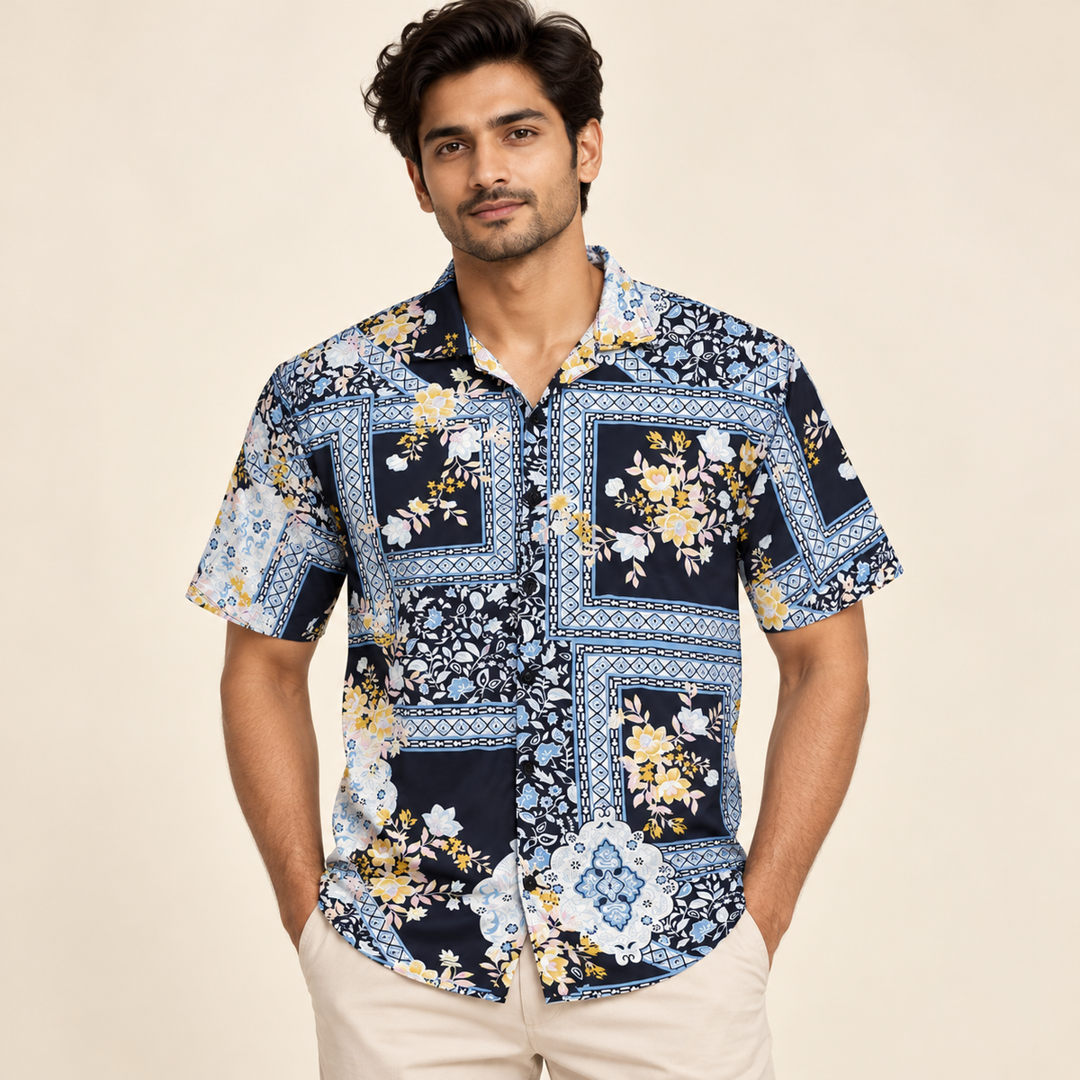 Navy multicolour floral border print short sleeve shirt on an adult model, front view