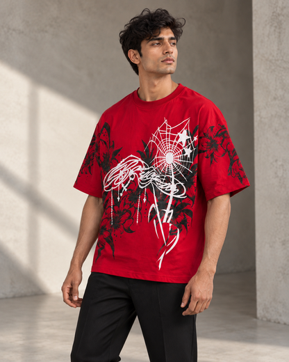 red floral spiderweb oversized T-shirt worn by a model, three-quarter front view