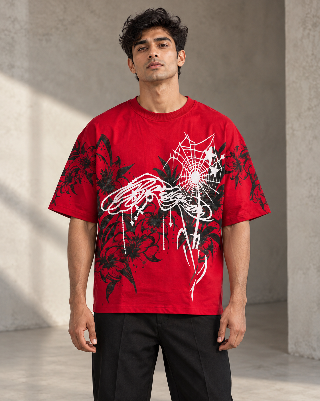 red floral spiderweb oversized T-shirt worn by a model, front view
