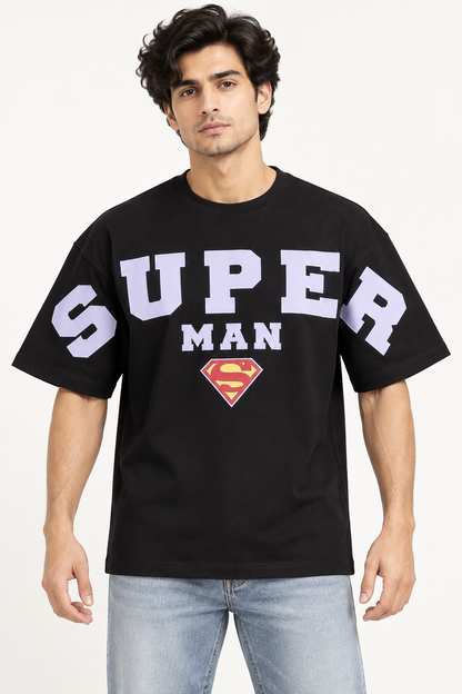 Black Super Man drop shoulder T-shirt, model wearing front view