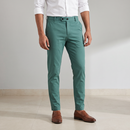 Green double button ankle fit pant on model