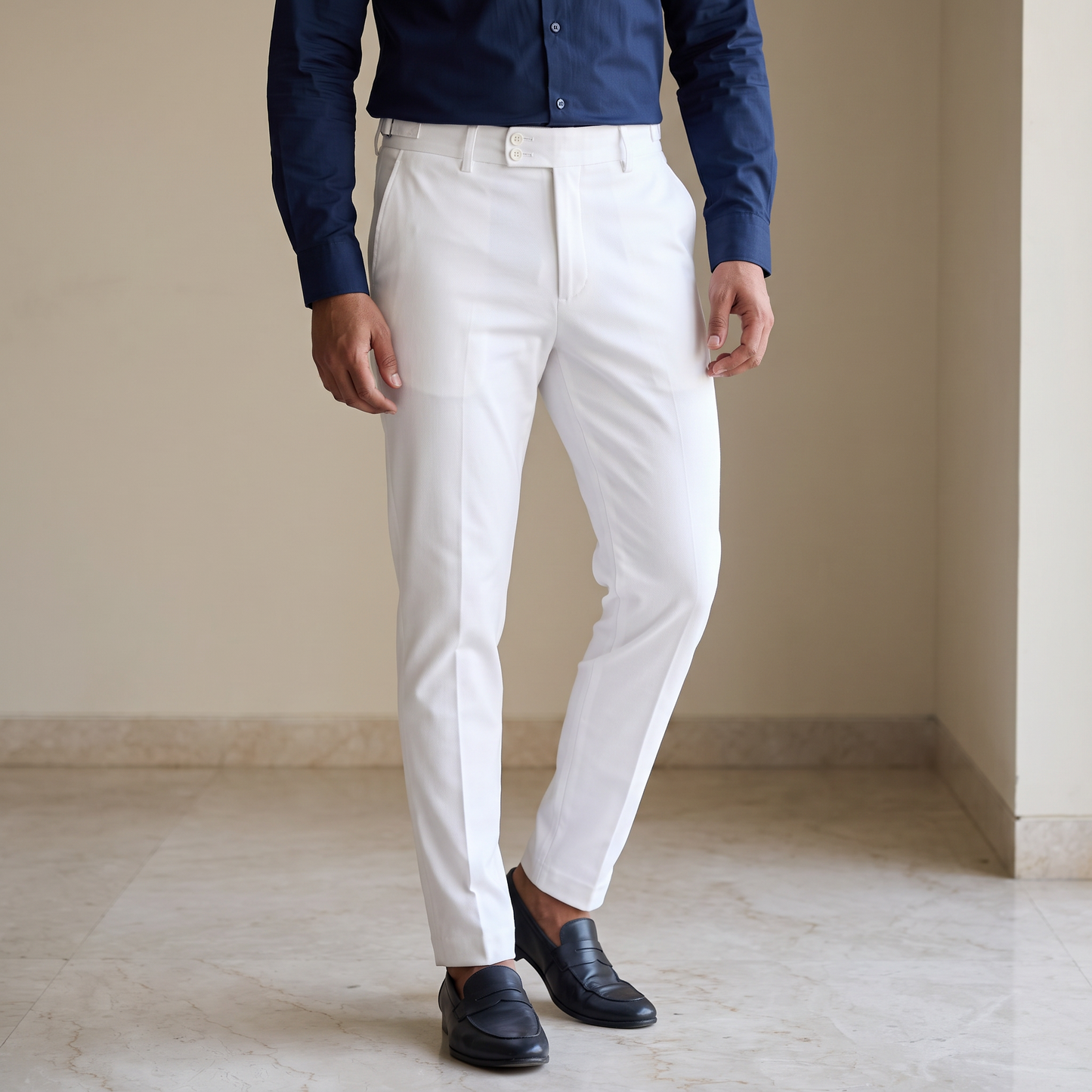 White double button ankle fit pant on model