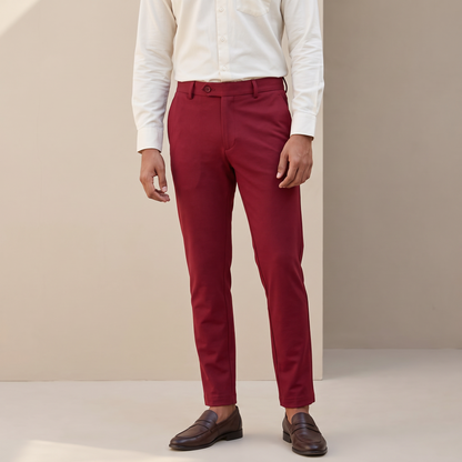 Red double button ankle fit pant on model