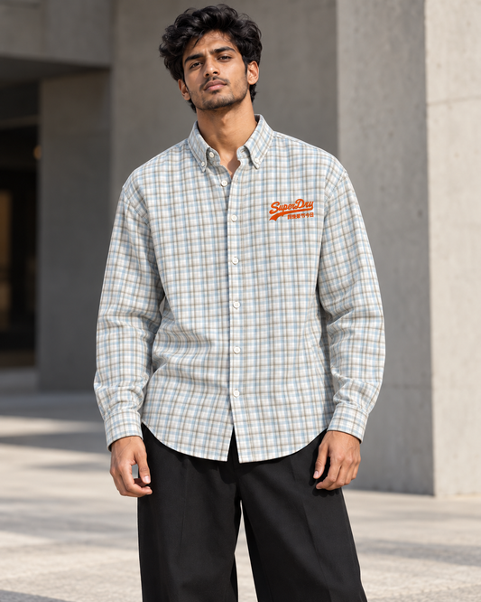 Ice Blue & Grey printed check shirt worn by a model, front view